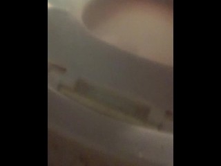 Young shaved pussy teen pisses all over phone in toilet kink