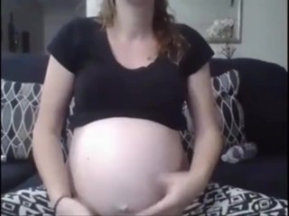 Pregnant Slut Mom with Glasses and Big Belly Rubs Baby Bump on Cam